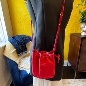 Cole Haan mini crossbody bucket bag.